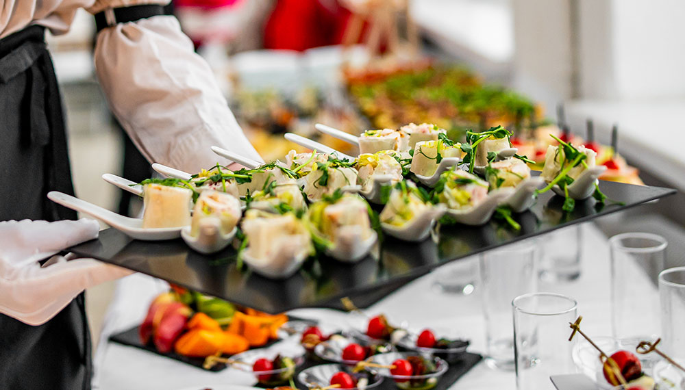 server with platter of food
