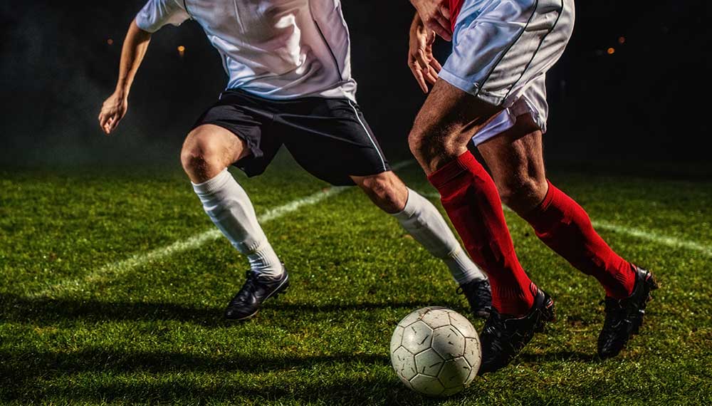 men playing soccer