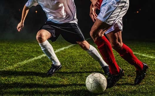 men playing soccer